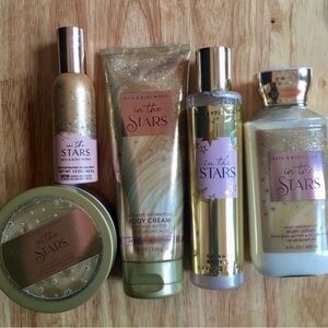 Bath & Body Works In The Stars Collection with Gold and Purple Accents